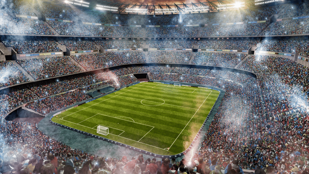 Large sports stadium filled with spectators, illustrating the carbon footprint associated with major sporting events.